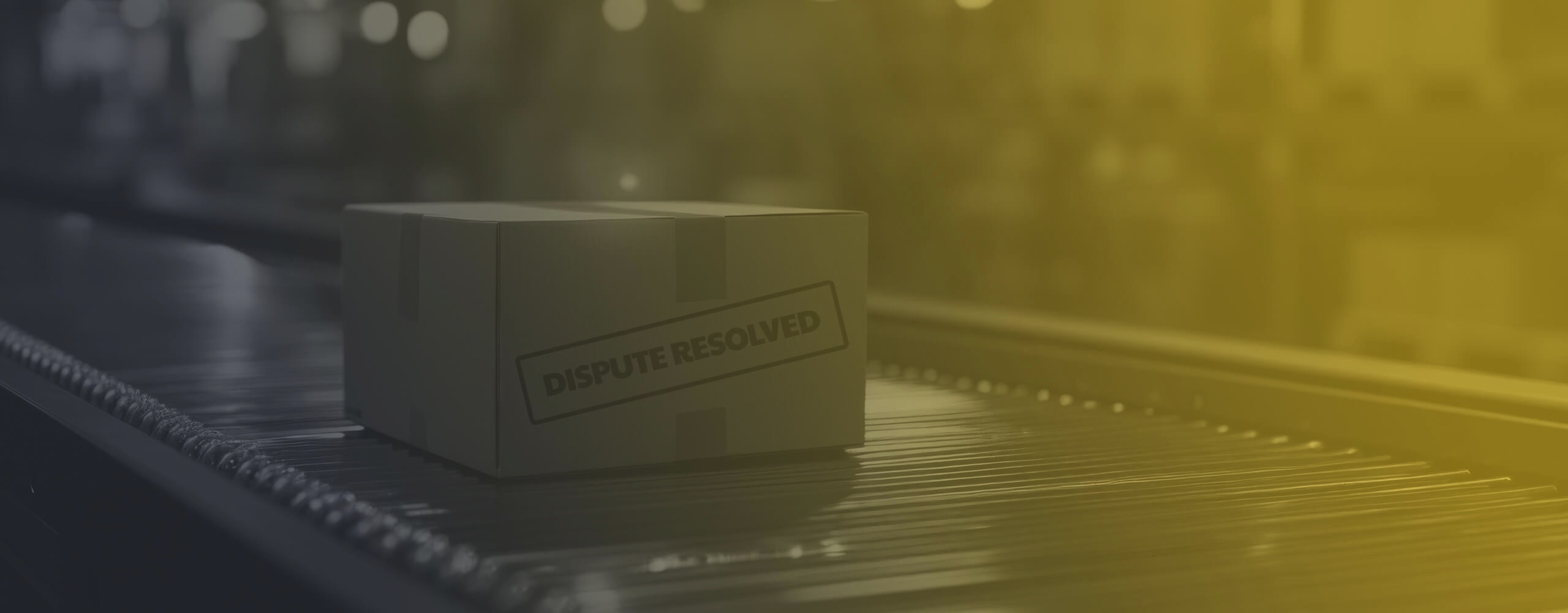 A 'dispute resolved' cardboard box on a conveyor belt